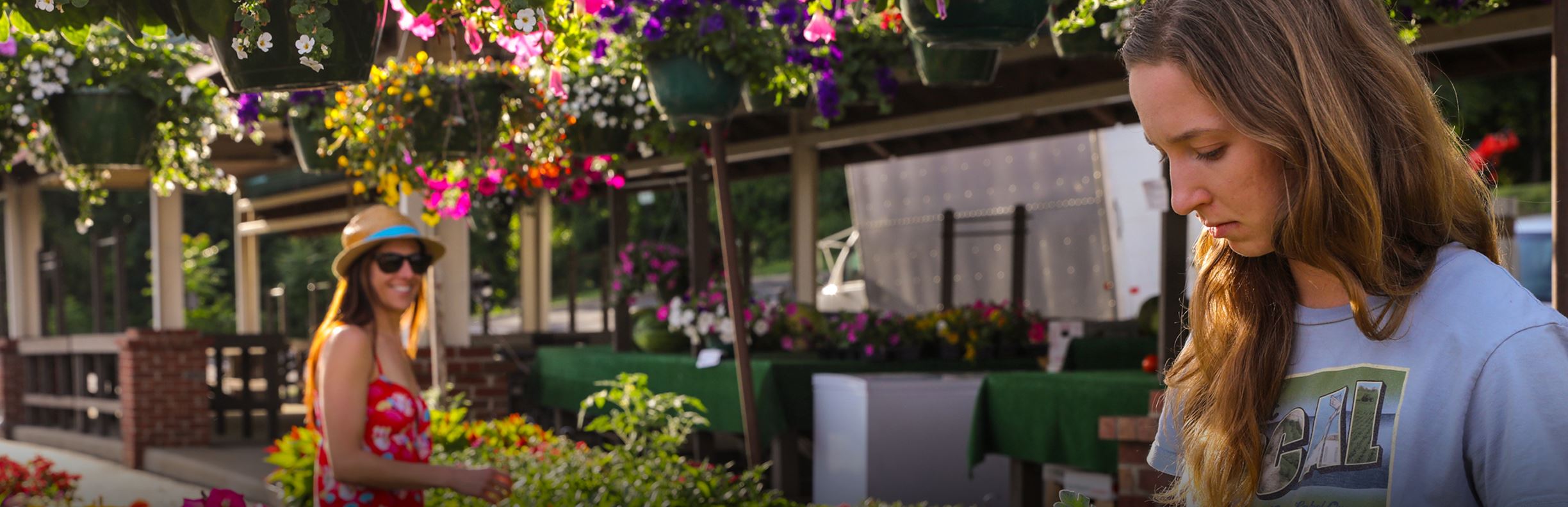 Women shopping at the Vinton Farmers' Market