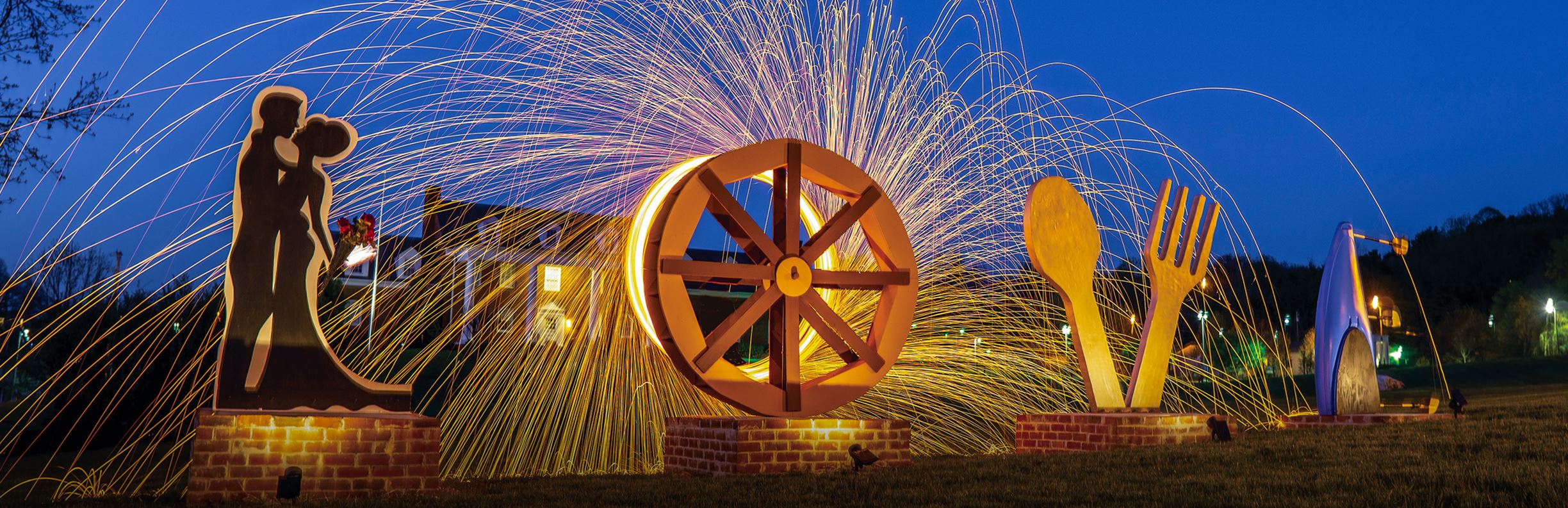 Fireworks at night at the Vinton LOVE Sign