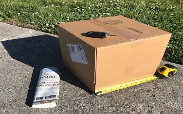 Box with measuring tape.